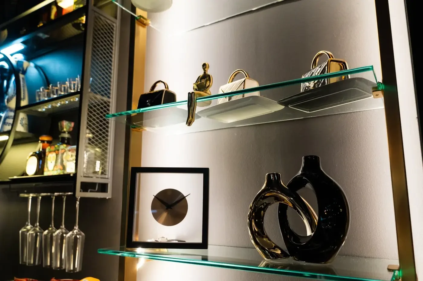 Luxzen display shelf — purse forms, ceramics and decorative objects.
