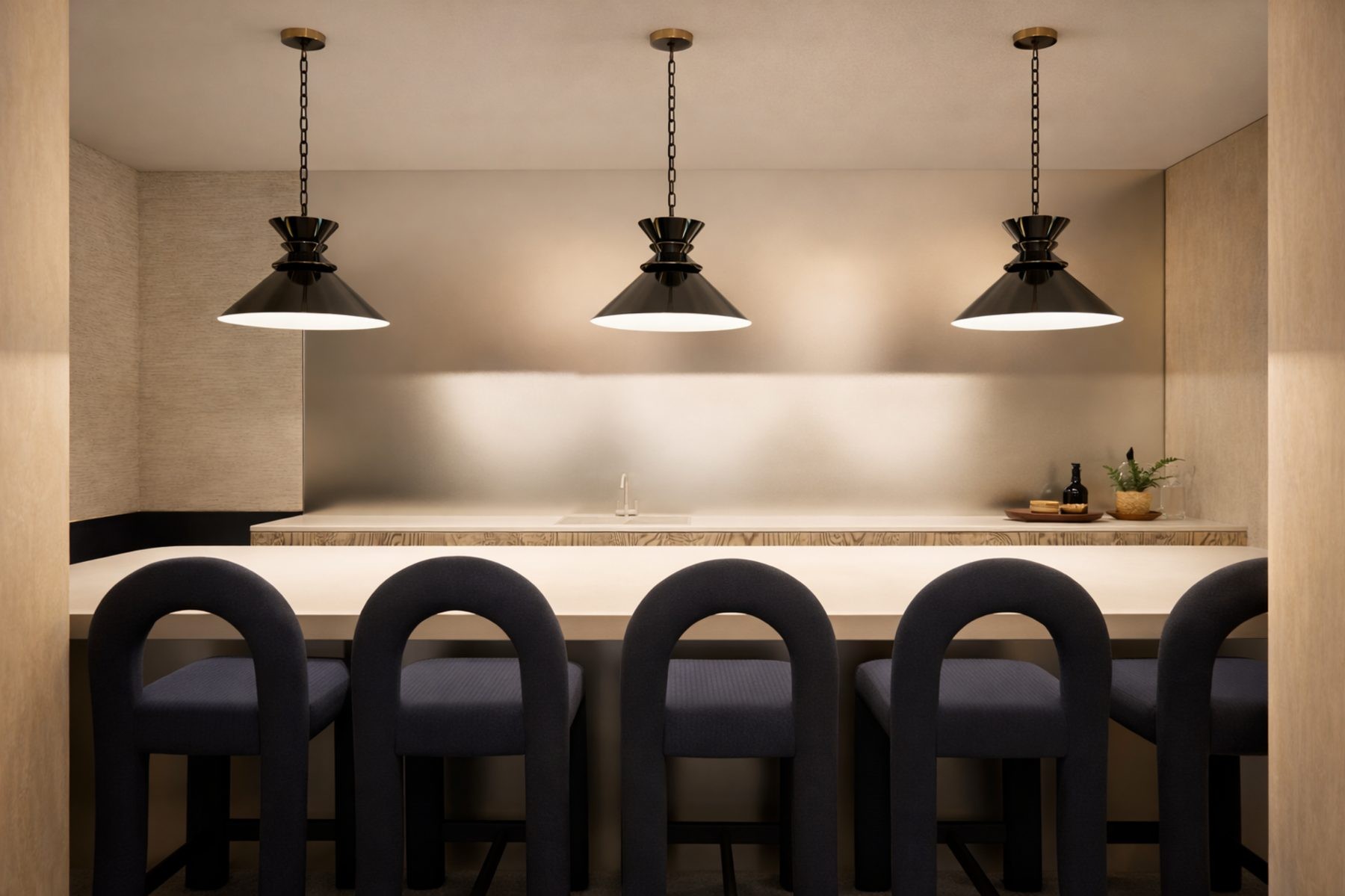 Gardens Clubhouse clubhouse design Miami — bar and entertaining zone with integrated back bar shelving, warm wood millwork and statement pendants, IV Atelier